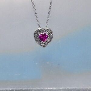 Sterling Silver Heart Pendant with Pink sapphire and diamond accents.
